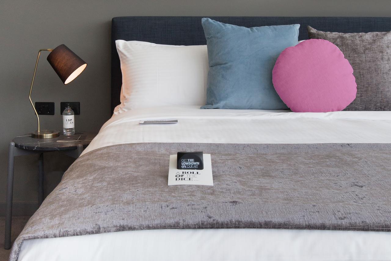 Art Series - The Chen Box Hill Exterior photo A bed with a throw